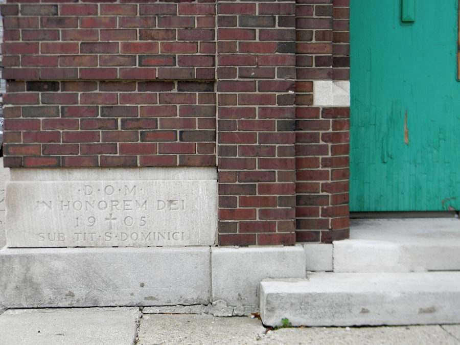View of 1905 cornerstone for Saint Dominic's Catholic Church at 357 West Locust Street